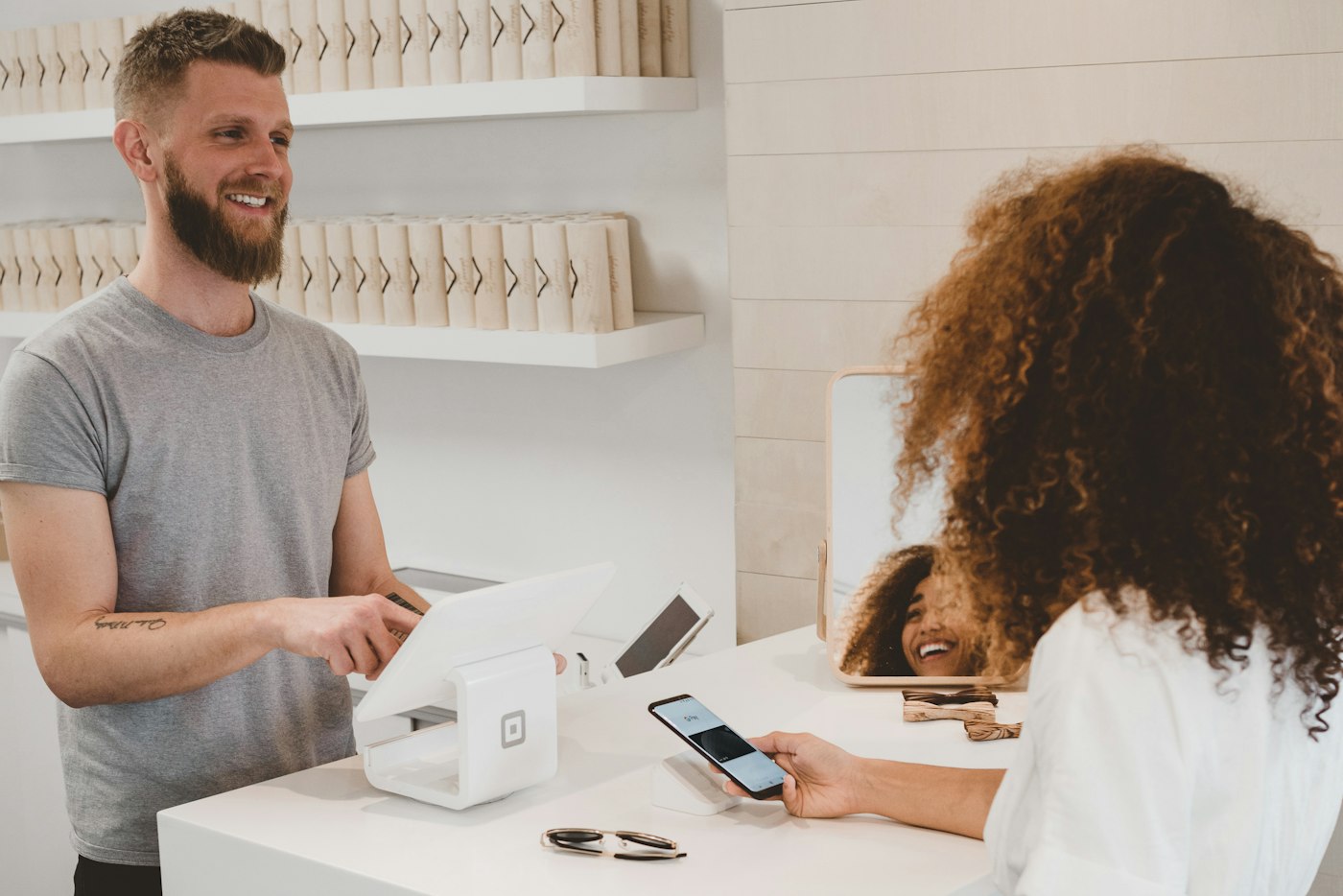 Owner collecting a customer payment